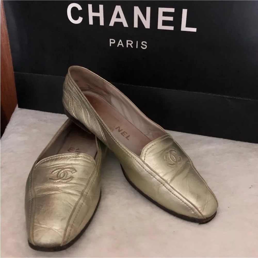 Authentic Chanel gold loafers